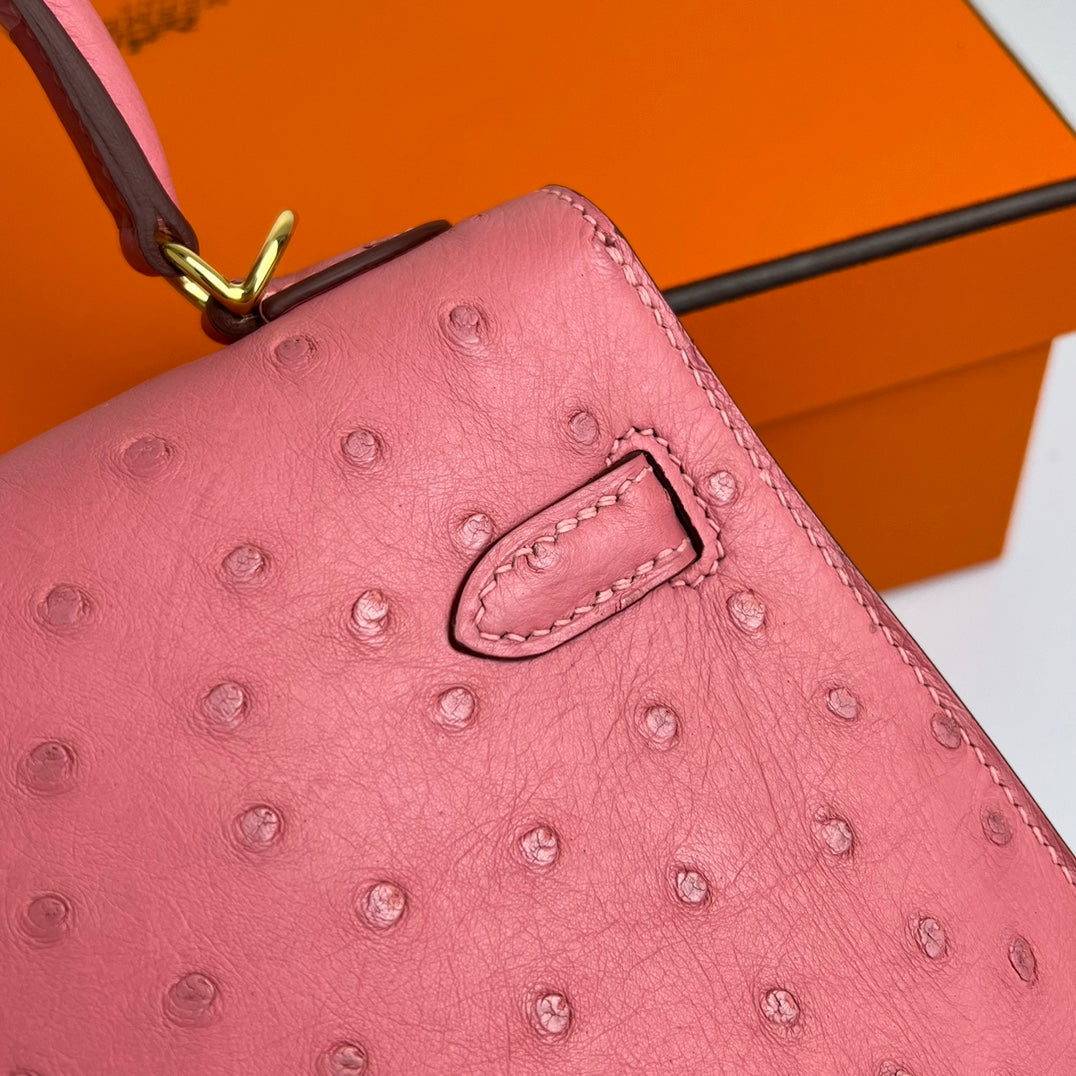HERMES KELLY BAG 20 IN ROUGE PINK OSTRICH LEATHER WITH GOLD HARDWARE