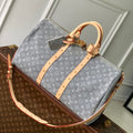 LOUIS VUITTON KEEPALL BANDOULIÈRE 45 IN GREY MONOGRAM DENIM LIGHT BROWN CALFSKIN