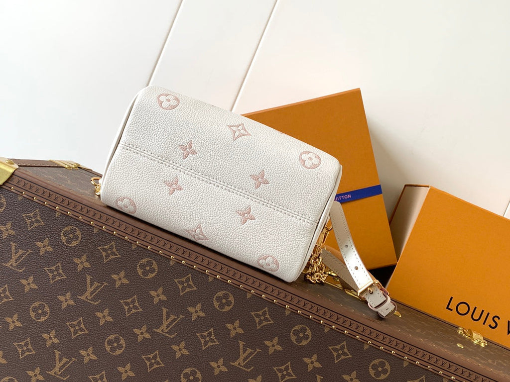 LOUIS VUITTON SPEEDY BANDOULIÈRE 21 IN WHITE AND PINK MONOGRAM CANVAS
